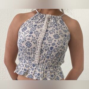 Hippie Rose halter-style white snd blue floral top.